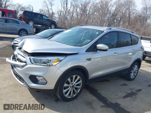 2017 Ford Escape Titanium with VIN 1FMCU0JD3HUB13234, listed as a IAAI auction lot 41760944 with 113,361 mi miles. Bid and sale history available at carsss.com. Image 14.