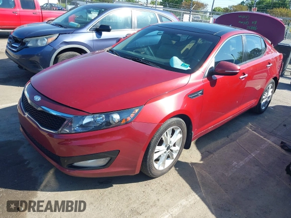 2011 Kia Optima EX with VIN KNAGN4A74B5076875, listed as a IAAI auction lot 42009937 with 190,484 mi miles and . Bid and sale history available at carsss.com. Image 2.