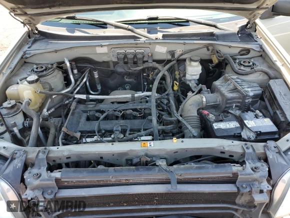2005 Mazda Tribute i with VIN 4F2YZ02Z65KM01780, listed as a Copart auction lot 70890314 with 119,107 mi miles and Salvage Title. Bid and sale history available at carsss.com. Image 11.