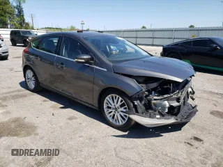 2016 Ford Focus Titanium with VIN 1FADP3N27GL201482, listed as a Copart auction lot 51768335 with 54,463 mi miles and Salvage title. Bid and sale history available at DreamBid. Image 4.