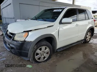 2008 Suzuki Grand Vitara w/Spare & Cargo Covers z VIN JS3TD941784101504, wystawiony jako Copart lot #77748764 z przebiegiem 200 826 mil mil oraz Nie do naprawy. Historia ofert i sprzedaży dostępna na DreamBid. Obrazek 1.