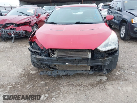 2013 Hyundai Veloster w/Gray Int z VIN KMHTC6AD8DU146035, wystawiony jako IAAI lot #41892703 z przebiegiem 241 169 mil mil oraz . Historia ofert i sprzedaży dostępna na DreamBid. Obrazek 6.