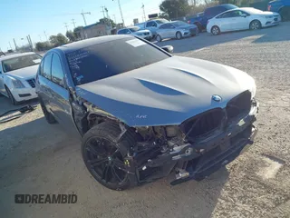 2019 BMW M5 with VIN WBSJF0C54KB448610, listed as a IAAI auction lot 41233170 with 66,484 mi miles. Bid and sale history available at carsss.com. Image 1.