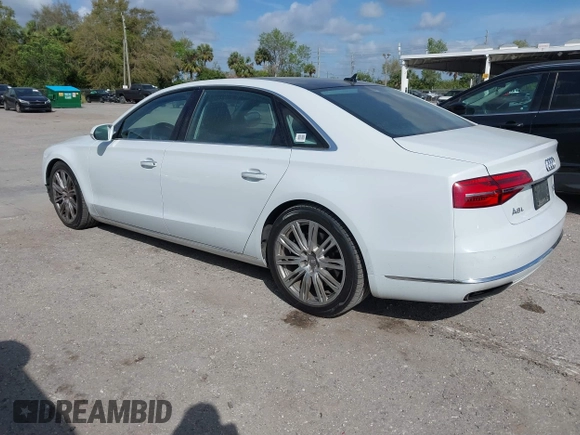 2015 Audi A8 L 4.0T with VIN WAU32AFD4FN002639, listed as a IAAI auction lot 41703951 with 103,722 mi miles. Bid and sale history available at carsss.com. Image 3.