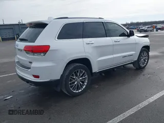 2018 Jeep Grand Cherokee Summit with VIN 1C4RJFJGXJC221513, listed as a IAAI auction lot 41487716 with 93,923 mi miles and . Bid and sale history available at DreamBid. Image 4.