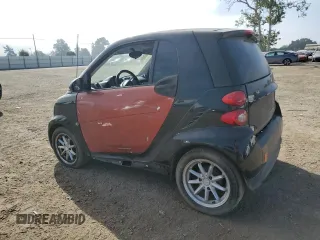 2014 Smart fortwo Pure z VIN WMEEJ3BA1EK753320, wystawiony jako Copart lot #55665555 z przebiegiem 71 305 mil mil oraz Szkody całkowita. Historia ofert i sprzedaży dostępna na DreamBid. Obrazek 2.