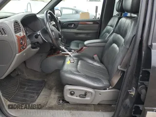 2004 GMC Envoy SLE with VIN 1GKDT13S442155788, listed as a Copart auction lot 50270135 with 164,271 mi miles and Salvage Title. Bid and sale history available at carsss.com. Image 7.