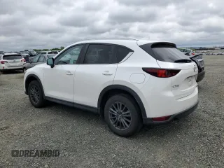 2020 Mazda CX-5 Touring with VIN JM3KFACM0L0857278, listed as a Copart auction lot 51980825 with 73,411 mi miles and Salvage Title. Bid and sale history available at carsss.com. Image 2.