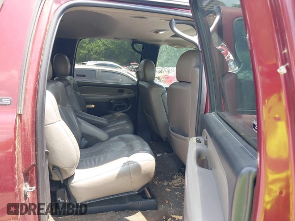 2002 Chevrolet Suburban LT with VIN 1GNFK16Z72J121807, listed as a IAAI auction lot 42384303 with Not provided miles and . Bid and sale history available at DreamBid. Image 8.