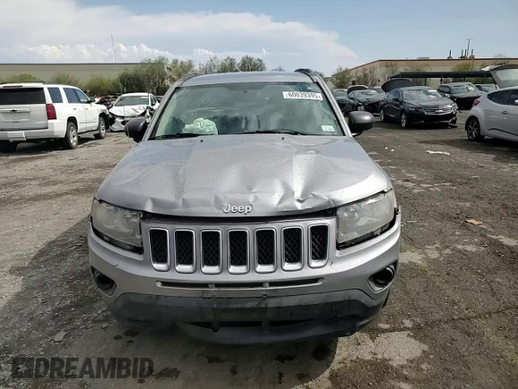 2016 Jeep Compass Sport with VIN 1C4NJCBA5GD612112, listed as a Copart auction lot 60039395 with 154,860 mi miles and Salvage title. Bid and sale history available at DreamBid. Image 14.