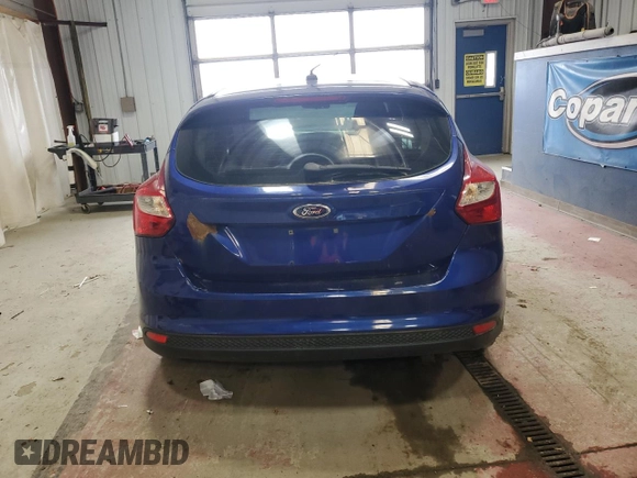 2012 Ford Focus SE z VIN 1FAHP3K23CL412887, wystawiony jako Copart lot #54366635 z przebiegiem 169 788 mil mil oraz Czysty tytuł • Clean title. Historia ofert i sprzedaży dostępna na DreamBid. Obrazek 6.