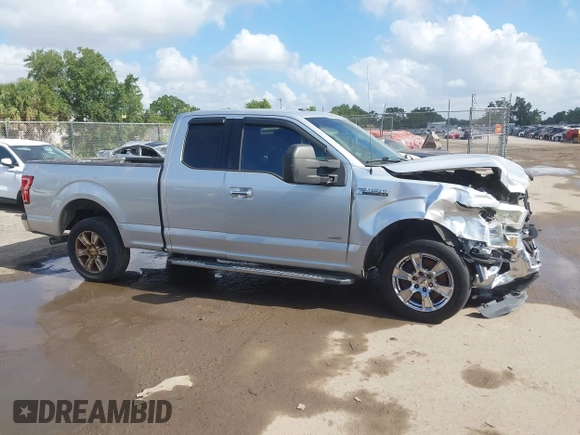 2015 Ford F-150 XL with VIN 1FTEX1CP1FKE81373, listed as a IAAI auction lot 42176024 with 186,808 mi miles. Bid and sale history available at carsss.com. Image 13.