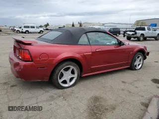 2003 Ford Mustang GT Deluxe with VIN 1FAFP45X53F357541, listed as a Copart auction lot 43738975 with 102,282 mi miles and Salvage Title. Bid and sale history available at carsss.com. Image 3.