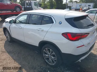 2022 BMW X2 sDrive28i with VIN WBXYH9C04N5U11829, listed as a IAAI auction lot 40184510 with 59,426 mi miles. Bid and sale history available at carsss.com. Image 3.