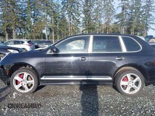 2005 Porsche Cayenne Turbo with VIN WP1AC29P25LA92448, listed as a IAAI auction lot 41976442 with 119,893 mi miles. Bid and sale history available at carsss.com. Image 14.