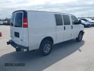 2022 GMC Savana Cargo Van with VIN 1GTW7AFP6N1220762, listed as a IAAI auction lot 41596612 with 23,305 mi miles. Bid and sale history available at carsss.com. Image 4.