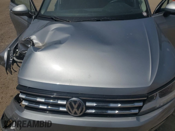 2021 Volkswagen Tiguan SE z VIN 3VV3B7AX9MM086196, wystawiony jako Copart lot #56989655 z przebiegiem 67 004 mil mil oraz Szkoda całkowita • Salvage title. Historia ofert i sprzedaży dostępna na DreamBid. Obrazek 12.