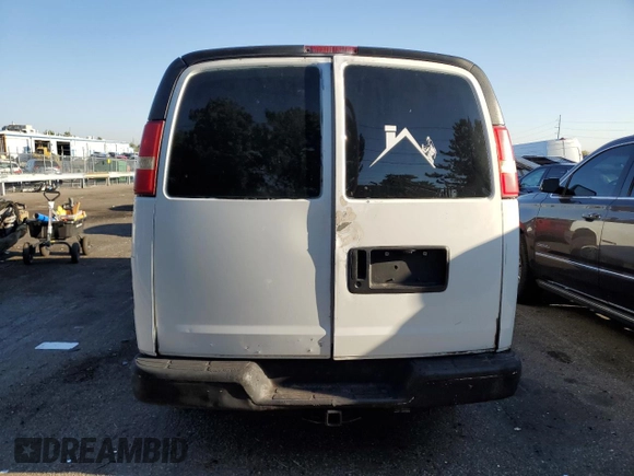 2003 GMC Savana Cargo Van with VIN 1GTGG25U031121692, listed as a Copart auction lot 70495844 with 57,614 mi miles and Salvage Title. Bid and sale history available at carsss.com. Image 6.