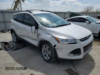 2013 Ford Escape SEL with VIN 1FMCU9H9XDUB08144, listed as a Copart auction lot 52887545 with 142,451 mi miles and Salvage Title. Bid and sale history available at DreamBid. Image 4.