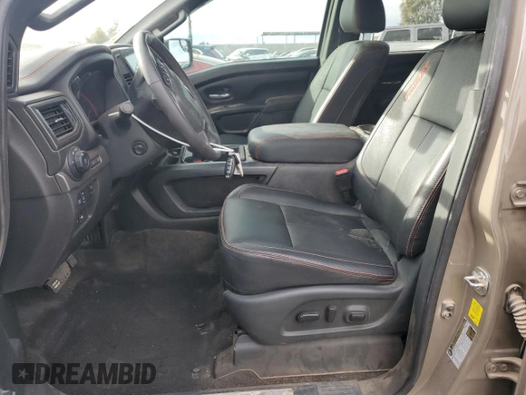 2024 Nissan Titan Pro-4X with VIN 1N6AA1ED3RN103011, listed as a Copart auction lot 87050954 with 8,829 mi miles and Salvage title. Bid and sale history available at DreamBid. Image 7.