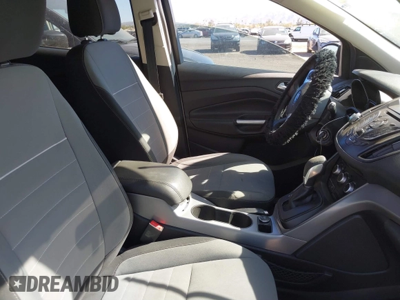 2015 Ford Escape SE with VIN 1FMCU0G7XFUA52818, listed as a IAAI auction lot 41679303 with 127,098 mi miles. Bid and sale history available at carsss.com. Image 5.