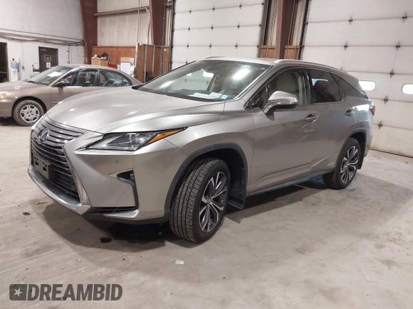 2018 Lexus RX 450hL Premium z VIN JTJDGKCA6J2004313, wystawiony jako IAAI lot #42270567 z przebiegiem 72 692 mil mil oraz . Historia ofert i sprzedaży dostępna na DreamBid. Obrazek 2.