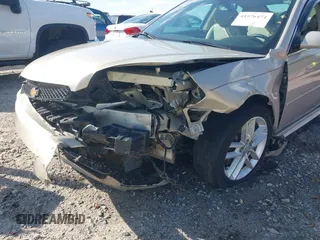 2012 Chevrolet Impala LTZ with VIN 2G1WC5E37C1180838, listed as a IAAI auction lot 41976474 with 107,397 mi miles and . Bid and sale history available at DreamBid. Image 6.