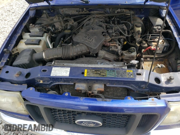 2005 Ford Ranger XLT z VIN 1FTZR45EX5PA03656, wystawiony jako Copart lot #53868545 z przebiegiem 181 970 mil mil oraz Czysty tytuł • Clean title. Historia ofert i sprzedaży dostępna na DreamBid. Obrazek 11.
