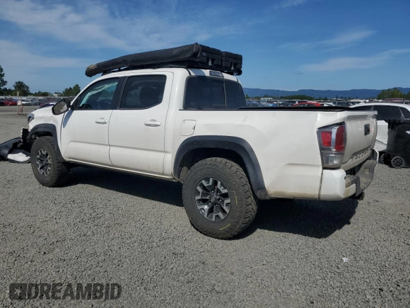 2022 Toyota Tacoma SR with VIN 3TYCZ5AN7NT056035, listed as a Copart auction lot 55510145 with 42,897 mi miles and Salvage title. Bid and sale history available at DreamBid. Image 2.
