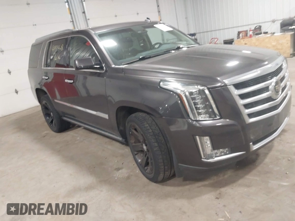 2015 Cadillac Escalade Premium with VIN 1GYS4CKJ8FR308617, listed as a IAAI auction lot 41974608 with 154,014 mi miles and . Bid and sale history available at DreamBid. Image 1.