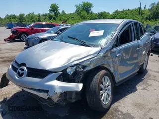 2011 Mazda CX-7 i Sport z VIN JM3ER2B55B0389115, wystawiony jako IAAI lot #42178894 z przebiegiem 237 552 mil mil oraz . Historia ofert i sprzedaży dostępna na DreamBid. Obrazek 17.