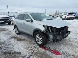 2019 Kia Sorento L with VIN 5XYPG4A31KG547981, listed as a IAAI auction lot 41253059 with 97,104 mi miles. Bid and sale history available at carsss.com. Image 1.