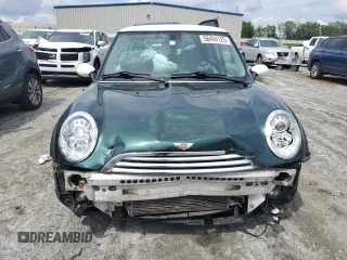 2005 MINI Hardtop z VIN WMWRC33465TC56731, wystawiony jako Copart lot #56404125 z przebiegiem 167 455 mil mil oraz Szkoda całkowita • Salvage title. Historia ofert i sprzedaży dostępna na DreamBid. Obrazek 5.