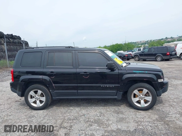 2015 Jeep Patriot Sport with VIN 1C4NJRBB1FD121420, listed as a IAAI auction lot 42344487 with 124,288 mi miles and . Bid and sale history available at DreamBid. Image 14.