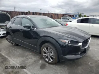2024 Mazda CX-30 S Carbon Edition z VIN 3MVDMBCM1RM618954, wystawiony jako Copart lot #53690825 z przebiegiem 16 776 mil mil oraz Szkoda całkowita • Salvage title. Historia ofert i sprzedaży dostępna na DreamBid. Obrazek 4.