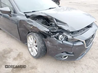 2014 Mazda 3 S Touring with VIN JM1BM1L30E1200337, listed as a IAAI auction lot 41906333 with 92,873 mi miles and . Bid and sale history available at DreamBid. Image 6.
