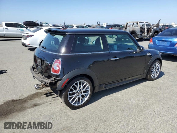 2011 MINI Hardtop S with VIN WMWSV3C57BTY16043, listed as a Copart auction lot 59337575 with 84,617 mi miles and Salvage title. Bid and sale history available at DreamBid. Image 3.