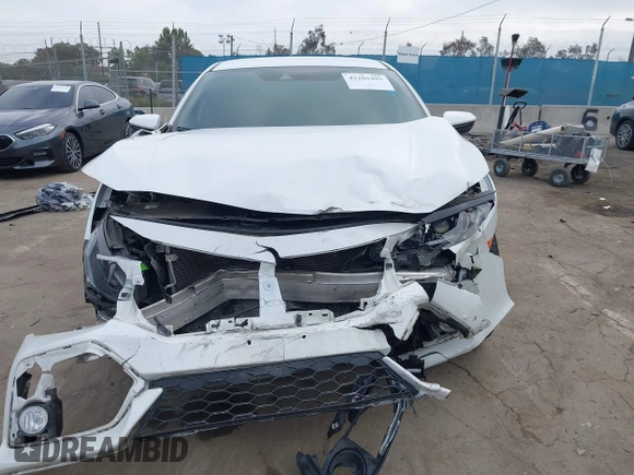 2021 Honda Civic Sport with VIN SHHFK7H42MU419784, listed as a IAAI auction lot 42202495 with 55,958 mi miles and . Bid and sale history available at DreamBid. Image 12.