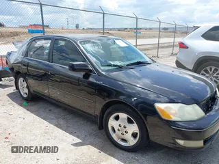 2003 Toyota Avalon XL z VIN 4T1BF28B83U337565, wystawiony jako IAAI lot #42238001 z przebiegiem 316 720 mil mil oraz . Historia ofert i sprzedaży dostępna na DreamBid. Obrazek 1.