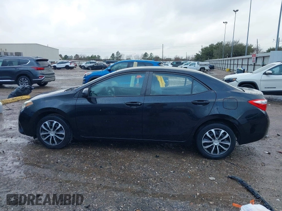 2015 Toyota Corolla L with VIN 5YFBURHE1FP352715, listed as a IAAI auction lot 41696284 with 121,906 mi miles and . Bid and sale history available at DreamBid. Image 14.
