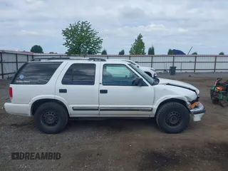 2000 Chevrolet Blazer LT с VIN 1GNDT13W1Y2366880, выставлен на аукционе IAAI как лот 42282543 с пробегом 245 806 миль миль и . История ставок и продаж доступна на DreamBid. Изображение 13.