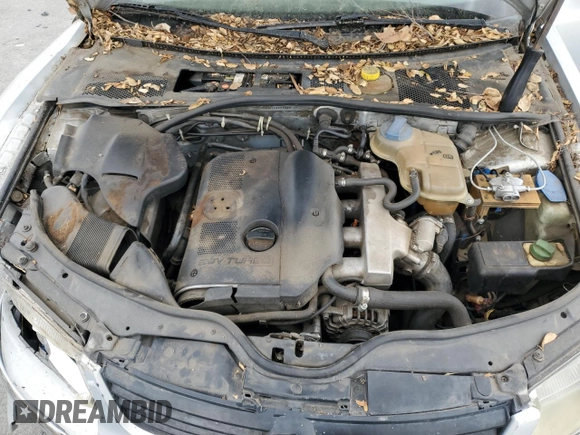 2000 Volkswagen Passat z VIN WVWMA23B3YP228438, wystawiony jako Copart lot #48724625 z przebiegiem 204 670 mil mil oraz Szkoda całkowita • Salvage title. Historia ofert i sprzedaży dostępna na DreamBid. Obrazek 11.