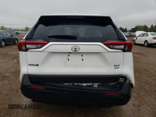 2021 Toyota RAV4 XLE with VIN 2T3P1RFV6MW228427, listed as a Copart auction lot 55323325 with 54,002 mi miles and Salvage title. Bid and sale history available at DreamBid. Image 6.