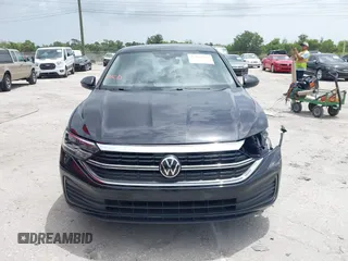2023 Volkswagen Jetta SE with VIN 3VW7M7BU3PM037141, listed as a IAAI auction lot 42446046 with 21,149 mi miles and . Bid and sale history available at DreamBid. Image 12.
