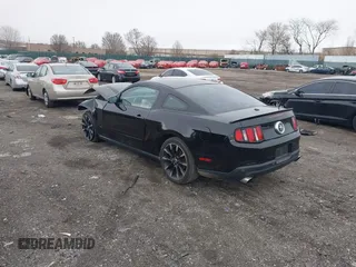 2012 Ford Mustang Premium with VIN 1ZVBP8AM7C5249954, listed as a IAAI auction lot 41881033 with 119,887 mi miles and . Bid and sale history available at DreamBid. Image 3.