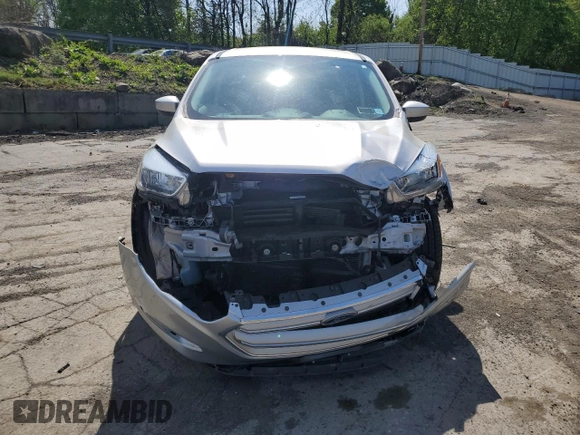 2017 Ford Escape SE with VIN 1FMCU9GD1HUD56021, listed as a Copart auction lot 55172625 with 79,023 mi miles and Salvage Title. Bid and sale history available at DreamBid. Image 5.