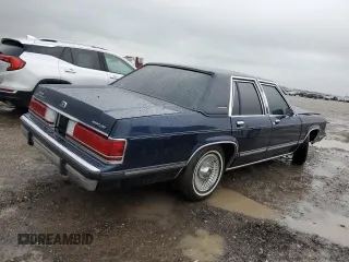 1991 Mercury Grand Marquis z VIN 2MECM75F1MX654700, wystawiony jako Copart lot #51007165 z przebiegiem 53 825 mil mil oraz Szkody całkowita. Historia ofert i sprzedaży dostępna na DreamBid. Obrazek 3.