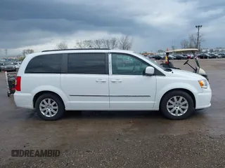 2016 Chrysler Town & Country Touring with VIN 2C4RC1BG3GR187720, listed as a IAAI auction lot 42088954 with 122,127 mi miles. Bid and sale history available at carsss.com. Image 13.