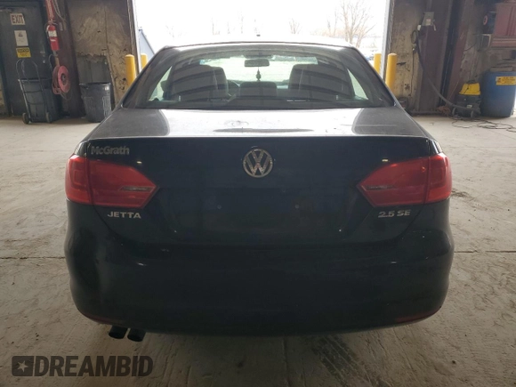 2013 Volkswagen Jetta SE with VIN 3VWDX7AJXDM427263, listed as a Copart auction lot 52502585 with 243,457 mi miles and Salvage title. Bid and sale history available at DreamBid. Image 6.