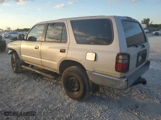2000 Toyota 4Runner with VIN JT3GM84RXY0063021, listed as a Copart auction lot 82144274 with 310,186 mi miles and Salvage Title. Bid and sale history available at carsss.com. Image 2.